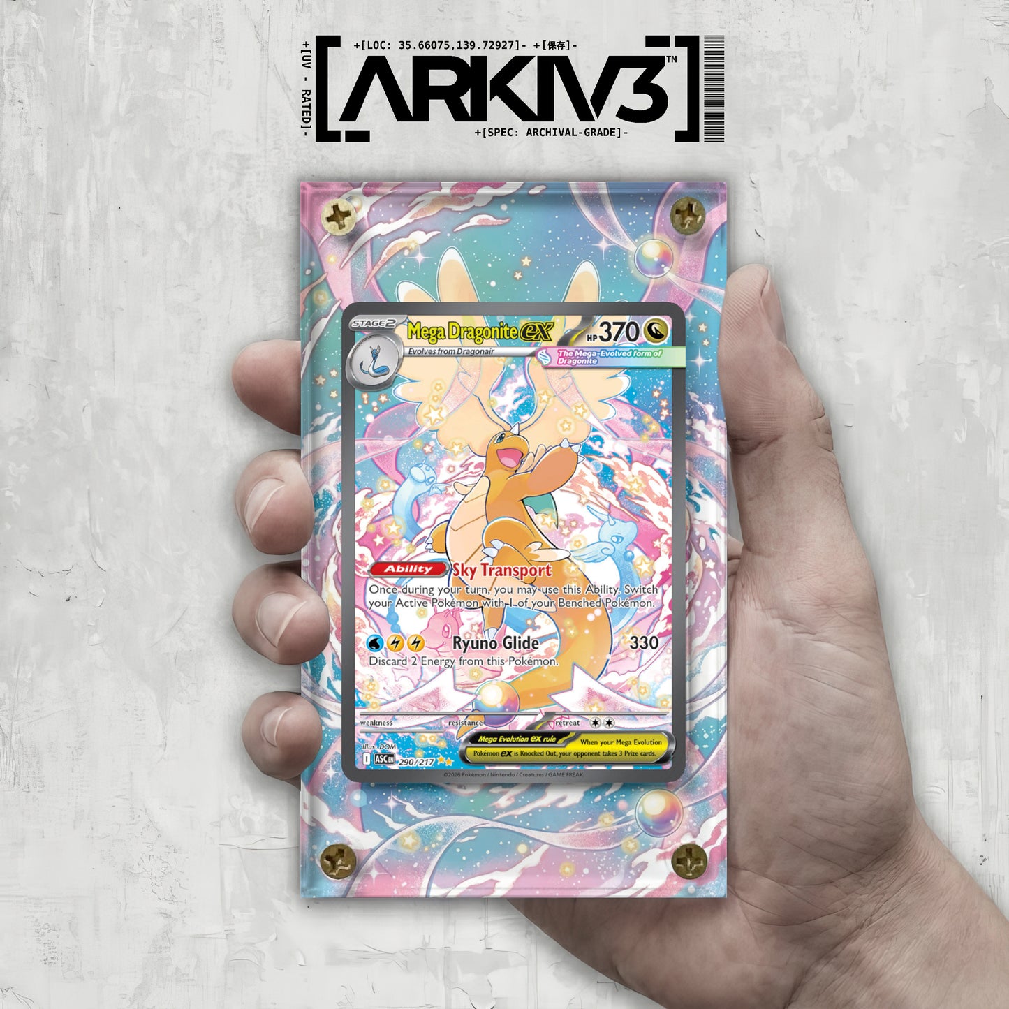 Hand holding Mega Dragonite ex Extended Art card in a screw-down display case by ARKIV3, showcasing detailed artwork.