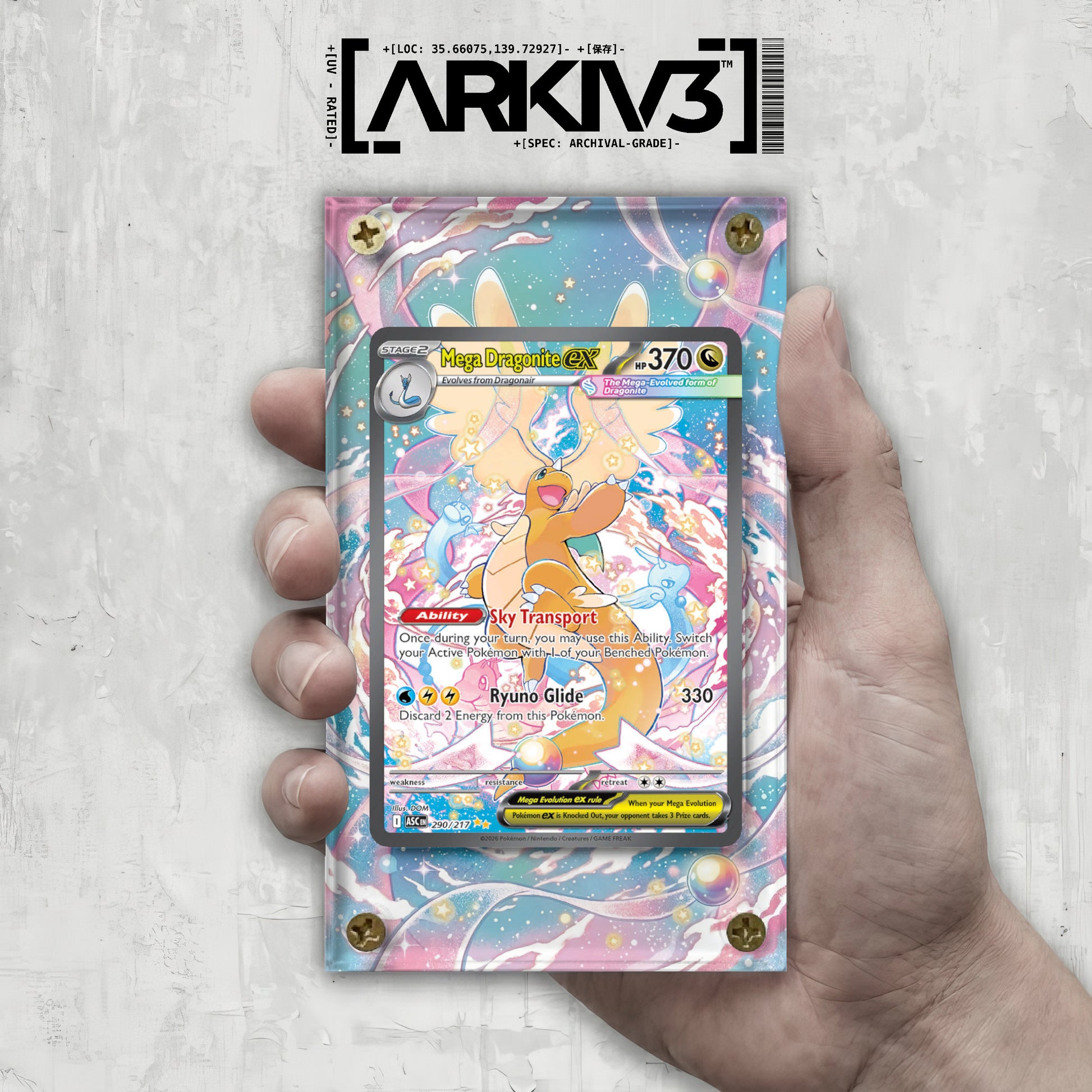 Hand holding Mega Dragonite ex Extended Art card in a screw-down display case by ARKIV3, showcasing detailed artwork.